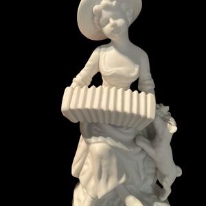 Porcelain Figurine - Woman Playing an Accordion for her Puppy!